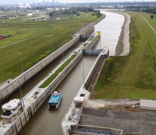 Aerial view of a Riverboat at the Gateway Arch entering the lock system on a Lock-N-Dam Cruise with a view of downtown St. Louis in the background.