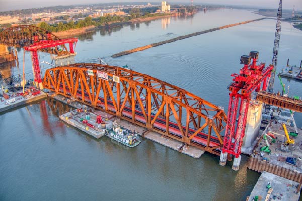 Truss piece of the Merchant's Bridge being ready to be placed in Downtown St. Louis