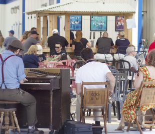 The band Miss Jubilee performs on the Riverboats' dock.