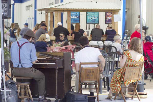 The band Miss Jubilee performs on the Riverboats' dock.